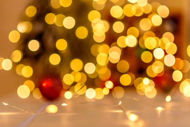 Photo christmas defocus festive design, defocused garland lights, bokeh effect