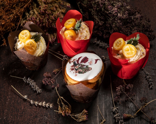 Christmas Dessert. Nicely decorated muffins on a wooden table