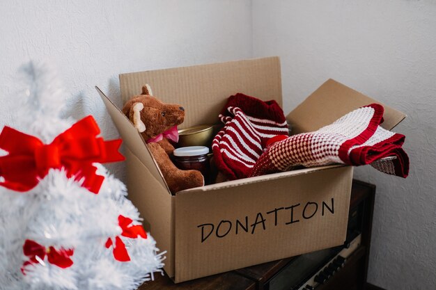 Christmas donation hampers help refugees and homeless xmas charity donation box with warm clothes