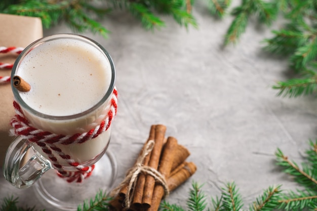 Christmas drink eggnog on the table with copy space