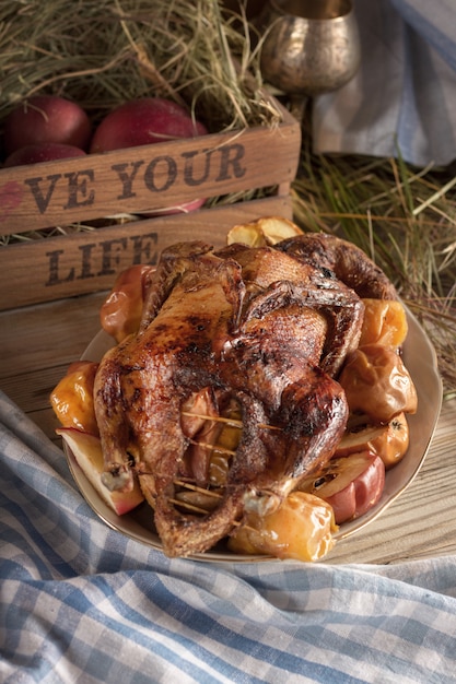 Christmas duck in apples on a plate