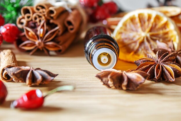 Christmas essential oils in a small bottle. Selective focus.