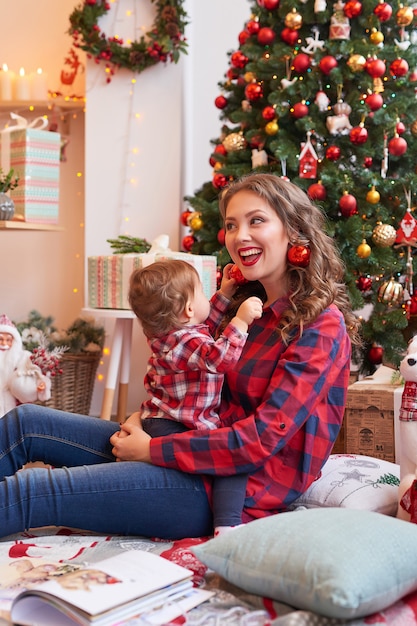 Christmas family Mom and son. Merry Christmas and Happy Holidays Portrait.