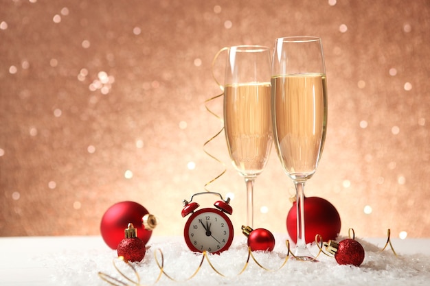 Christmas festive background with champagne in glasses