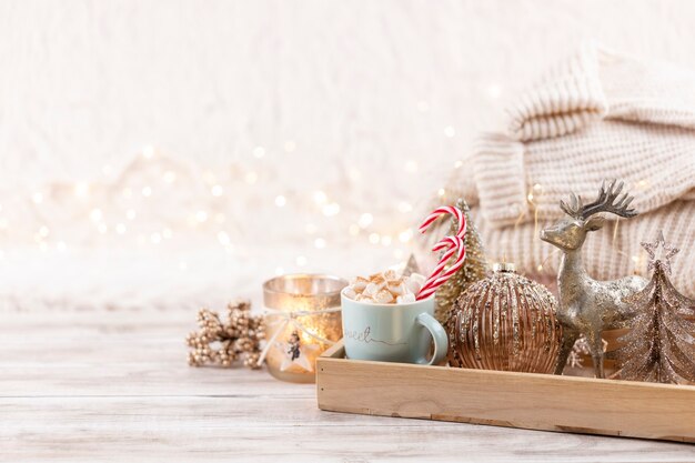 Christmas festive cozy decor still life on wooden background, concept of home comfort and holiday.