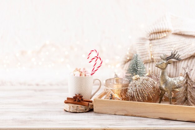 Christmas festive cozy decor still life on wooden background, concept of home comfort and holiday.