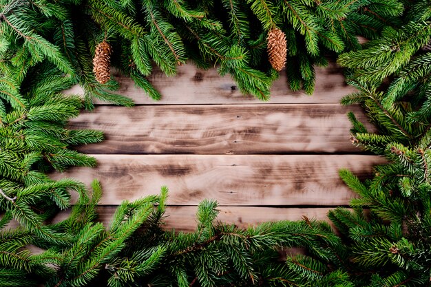 Christmas fir tree frame on natural wood