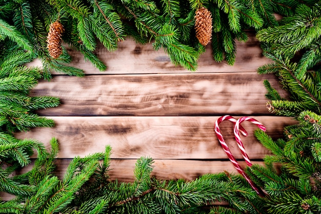 Christmas fir tree frame on natural wood