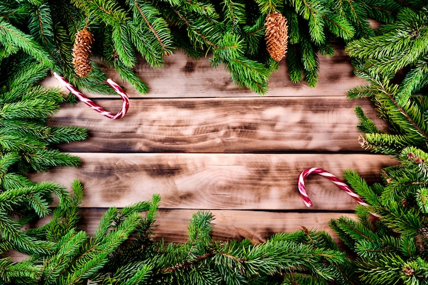 Christmas fir tree frame on natural wood