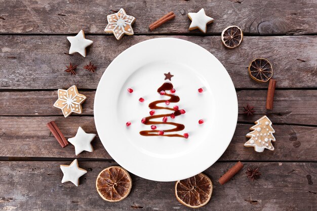 Christmas fir tree made from chocolate on plate, close up