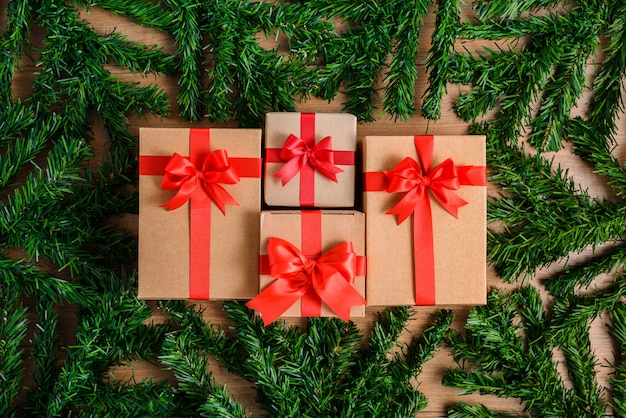 Christmas fir tree with decoration on wooden board