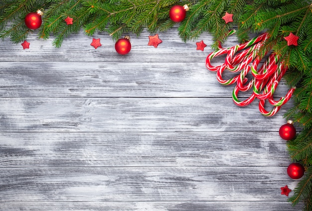 Christmas fir tree on wooden background