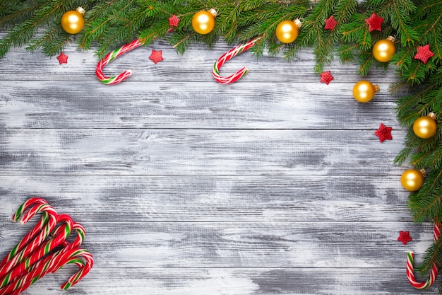 Christmas fir tree on wooden background