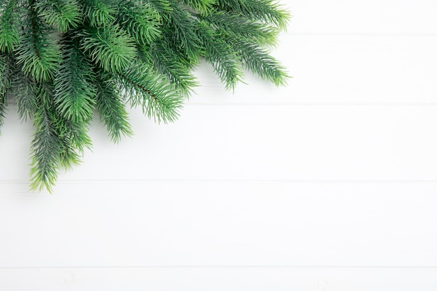 Christmas fir tree on the wooden board