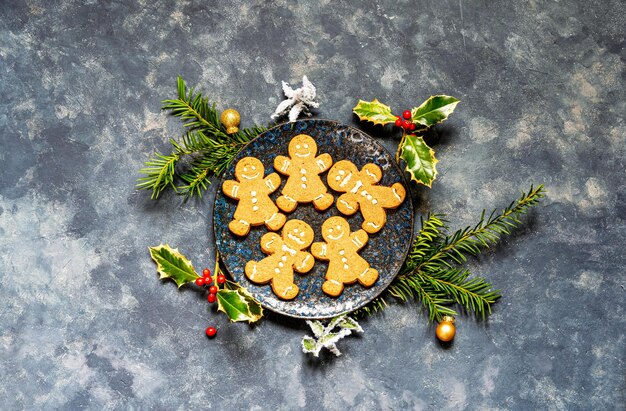 Christmas flat lay background with gingerbread man cookies