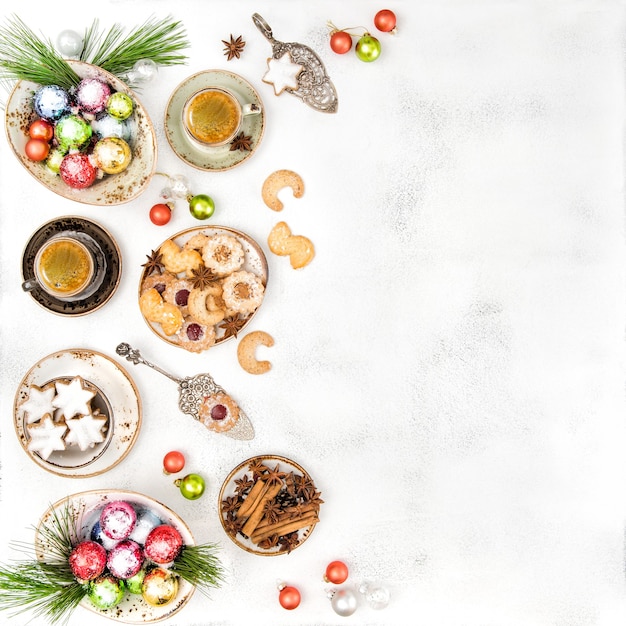 Christmas food and decoration. Traditional german cookies and coffee. Flat lay