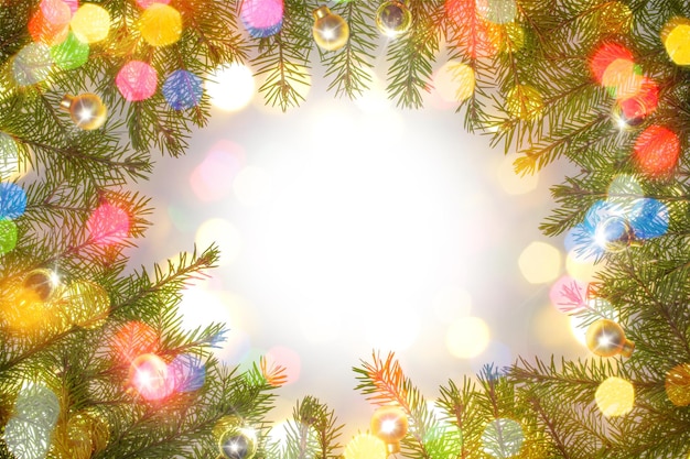 Christmas frame of fir branches gold Christmas balls colorful Xmas lights Top view Copy space