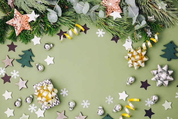 Christmas frame  with  Decorations in Green and Black colors. Flat lay, top view