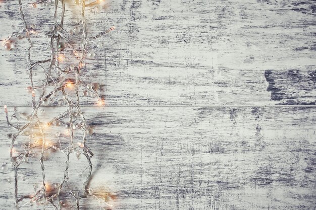 Christmas garland on a background of wood