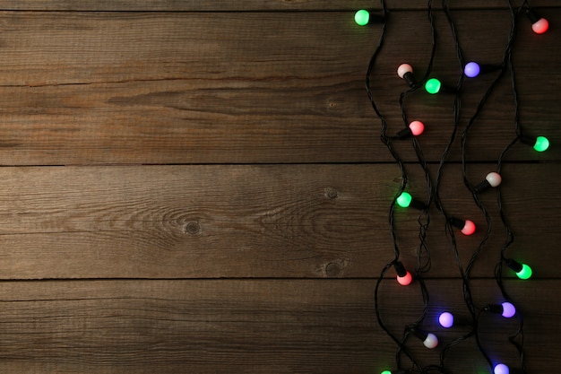 Christmas garland lights on grey, copy space