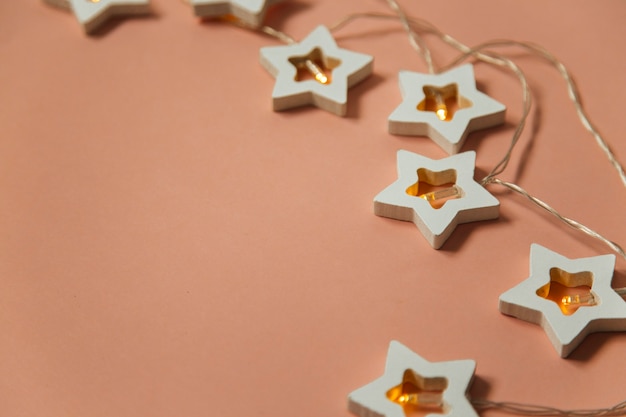 christmas garland on a pink background