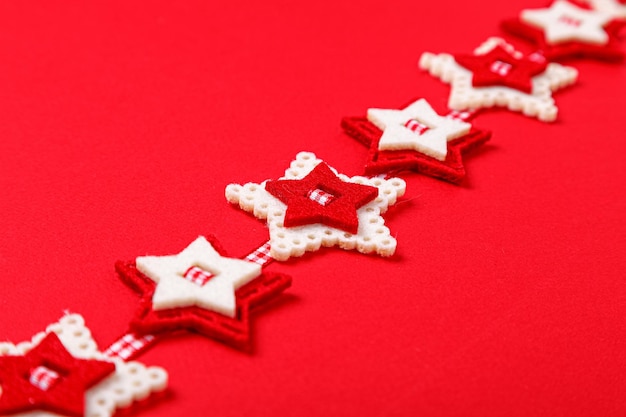 Christmas garland on a red background