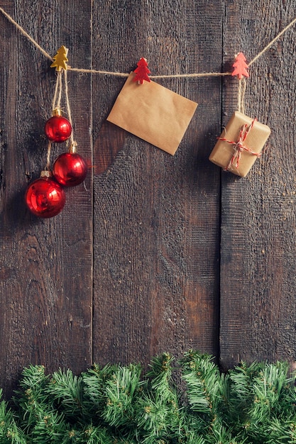 Christmas garland with toys and gifts on a dark wooden\
background christmas garland with toys and gifts on a dark wooden\
background with the effect instagram