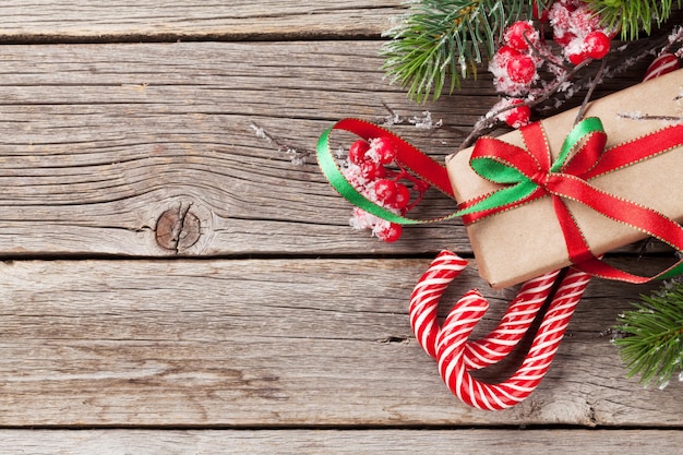 Christmas gift box candy canes and fir tree