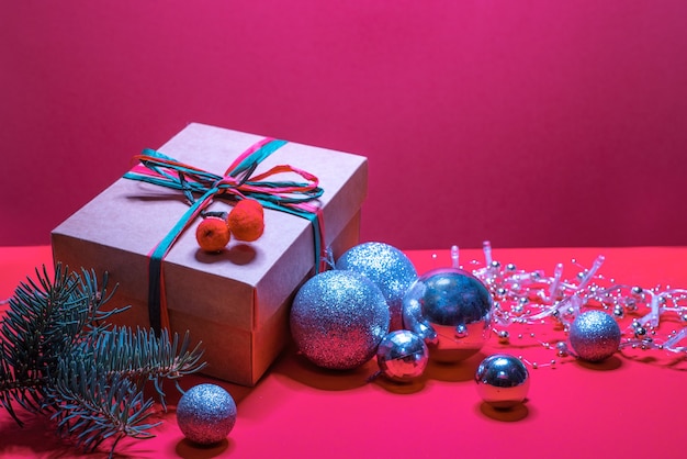 Christmas gift box and pine tree branch