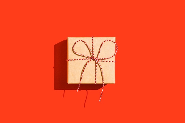 Christmas gift box on a red background