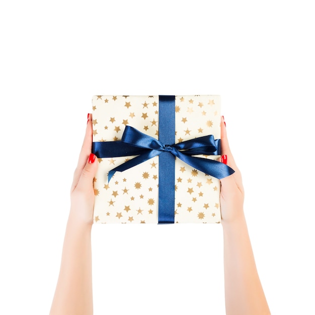 Christmas gift box  in woman hand