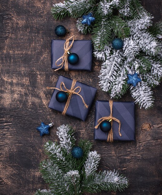 Christmas gift boxes in blue paper