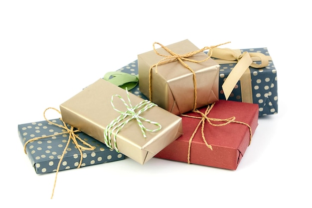 Christmas gift boxes heap isolated on white Wrapped gift boxes for holiday presents