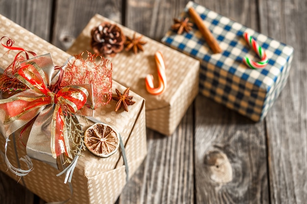 Christmas gift boxes on wooden table