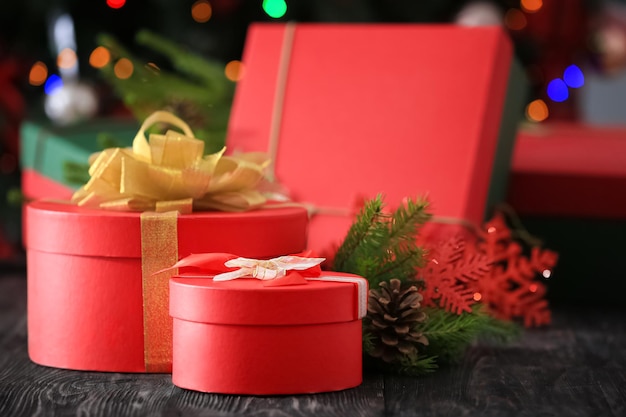 Christmas gift boxes on wooden table