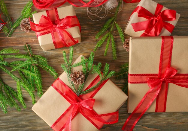 Christmas gift boxes on wooden table