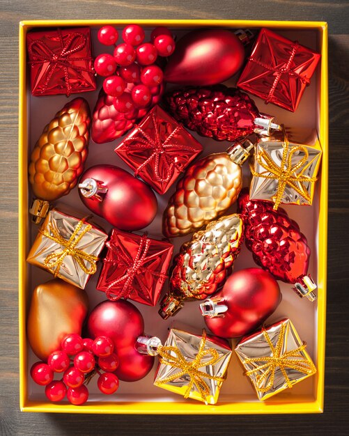 Christmas gift and decoration in yellow box