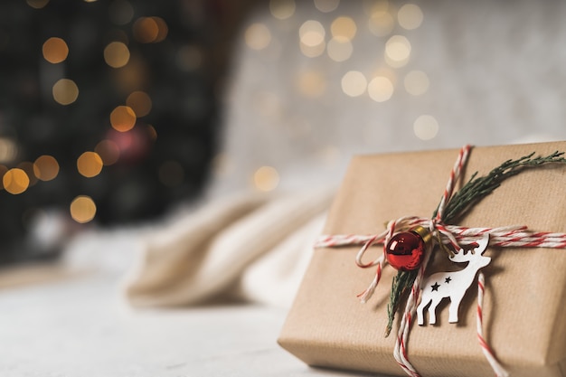 christmas gift and glowing bokeh.