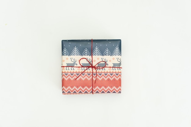 Photo christmas gift wrapped on white