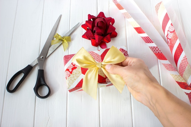 Christmas gift wrapping on white table