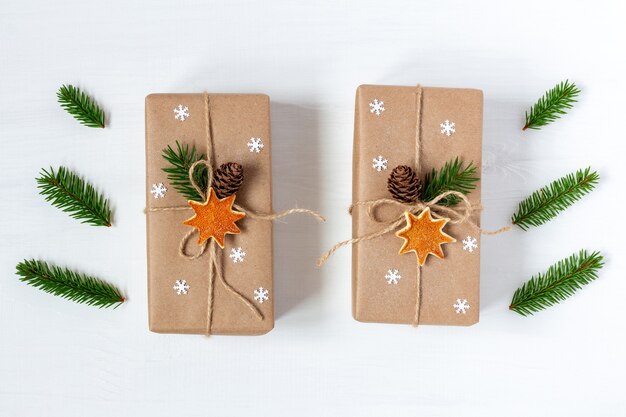 Christmas gifts in craft wrapping paper tied with twine