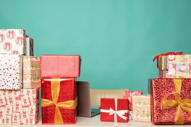 Christmas gifts lie on the table in modern santa's office