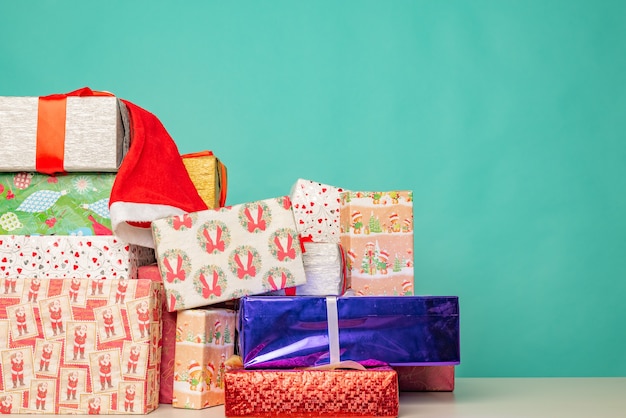 Christmas gifts lie on the table in modern santa's office