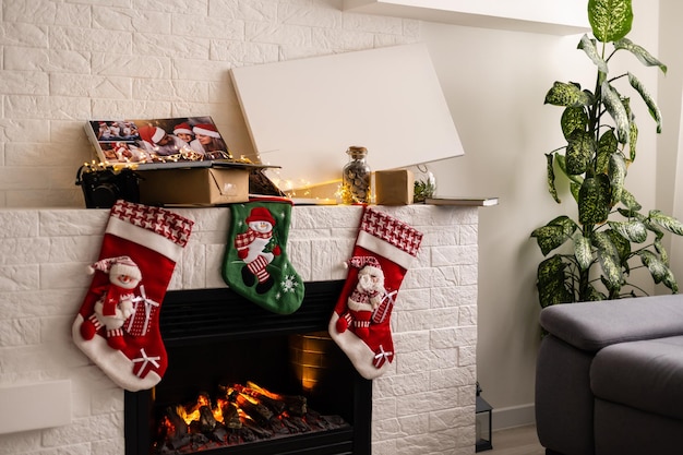 Christmas gifts, photo canvas on the fireplace