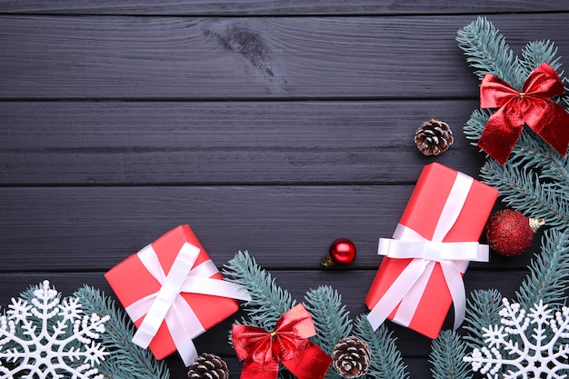 Christmas gifts presents with decorations on a black background.