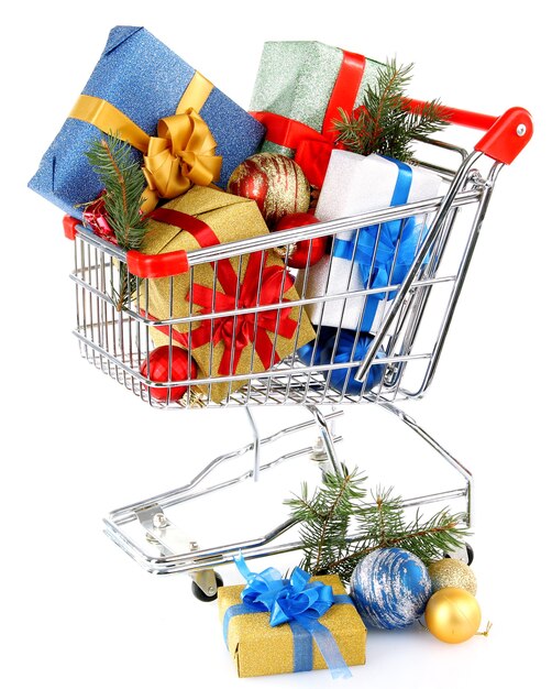 Christmas gifts in shopping trolley, isolated on white