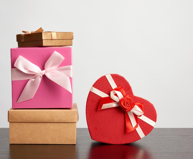 Christmas gifts on table against white background