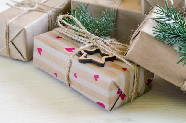 Christmas gifts on a white wooden table