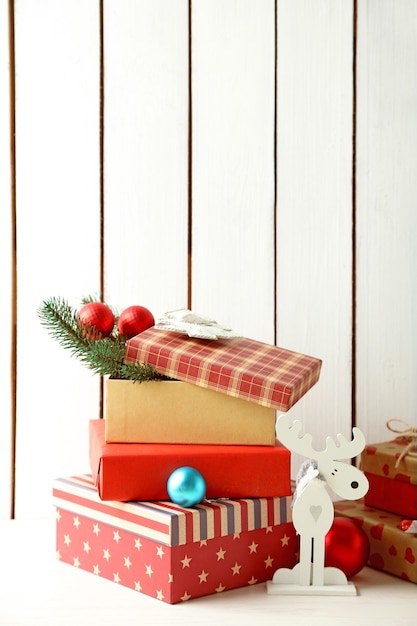 Christmas gifts on wooden background