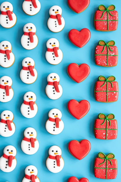 Christmas gingerbread on a blue background flat lay